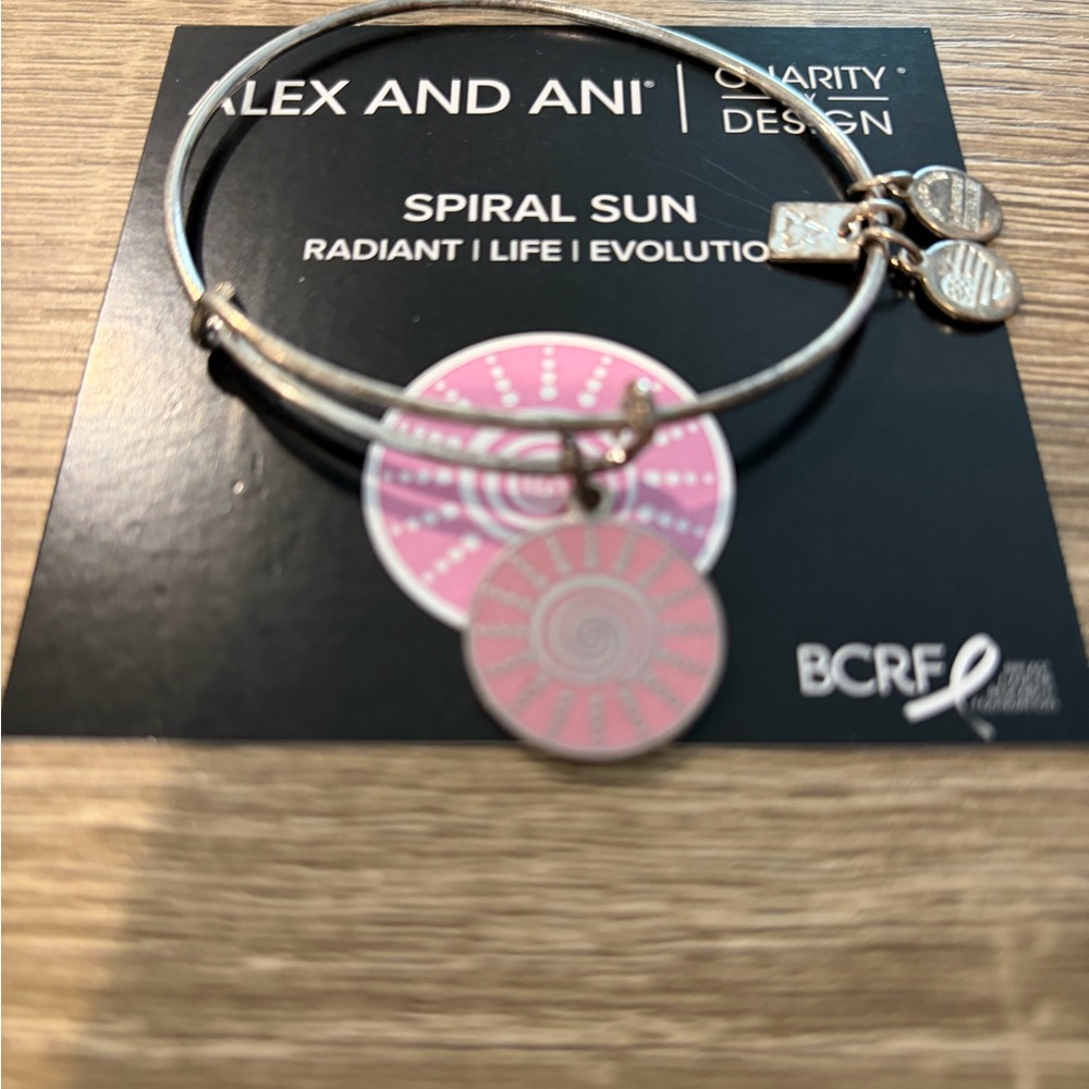 Alex and Ani Silver-Tone Bangle with Pink Spiral Sun Charm